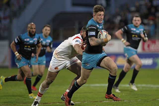 TOUGH TIME: Liam Sutcliffe tries to get a Rhinos attack going in Perpignan on Saturday. Picture: Pascal Rodriguez/SIPA.