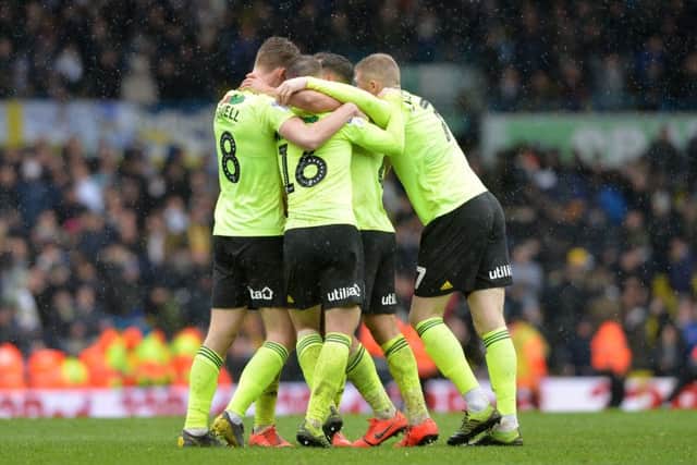 DRIVING SEAT: Sheffield United's players celebrate at full time at Elland Road last Saturday after beaing Leeds United. Picture: Bruce Rollinson.