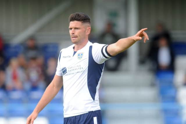 Guiseley's
Scott Garner came close to equalising at Hereford.