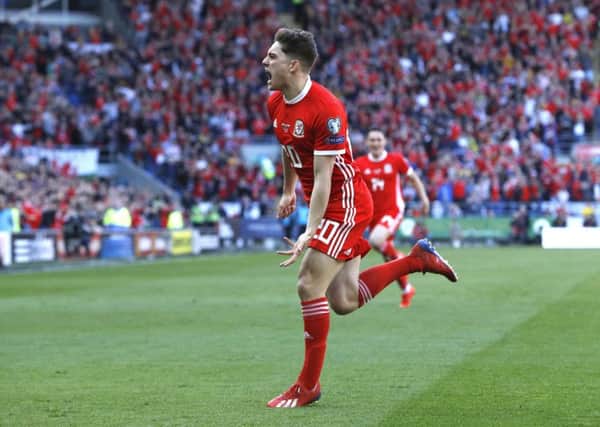 Wales' Daniel James celebrates scoring.