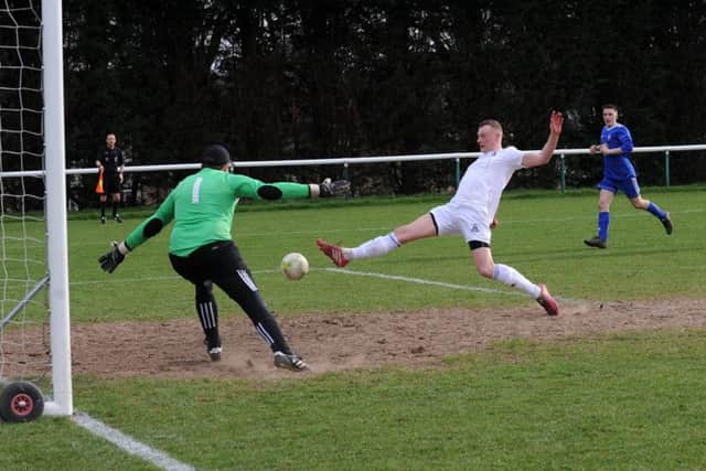 Adam Fowler at full stretch. PIC: Steve Riding