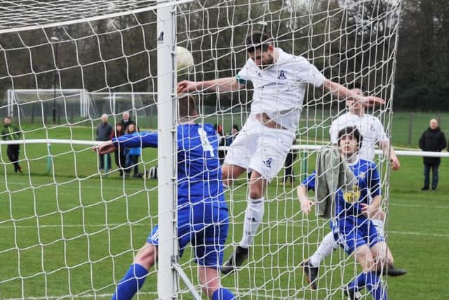 Adam Dutson scores for Leeds City. PIC: Steve Riding