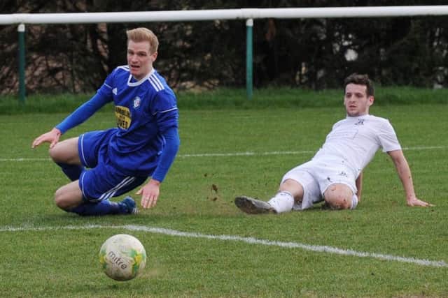 Ash Walker scores for Leeds City at Premier rivals Headingley. PIC: Steve Riding