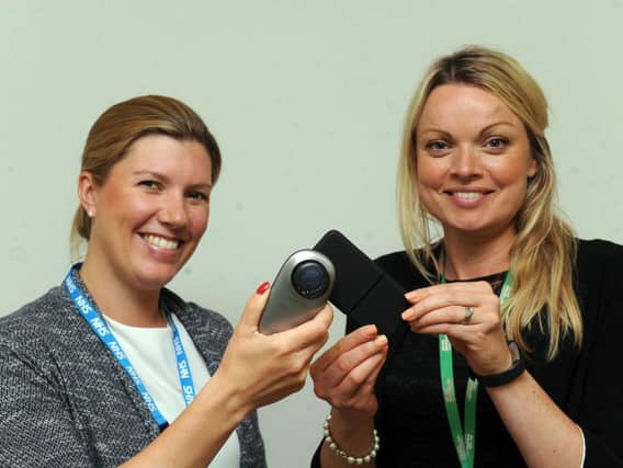 Dr Sarah Forbes and Macmillan's Helen Ryan with the equipment.