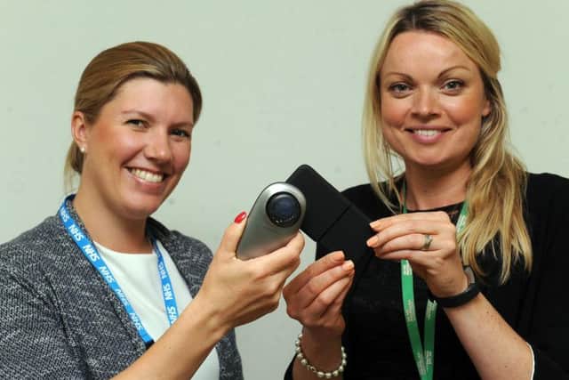 Dr Sarah Forbes and Macmillan's Helen Ryan with the equipment.