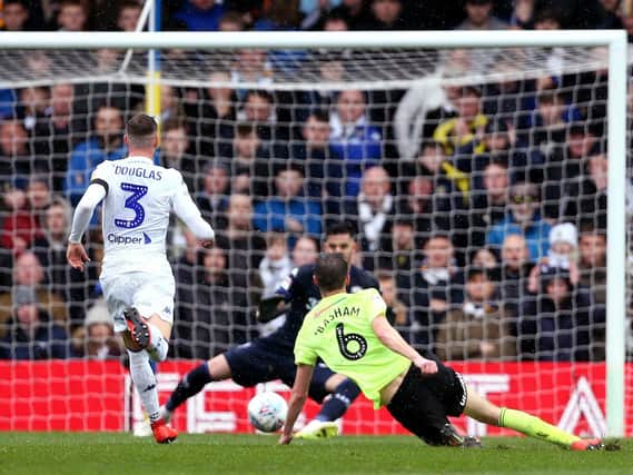 Sheffield United's Chris Basham drives home a second-half chance to inflict a 1-0 defeat on Leeds United at Elland Road.