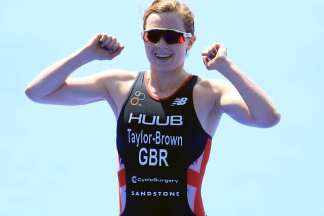 Georgia Taylor-Brown celebrates finishing second in the elite women's race during the 2018 ITU World Triathlon Series in Leeds.