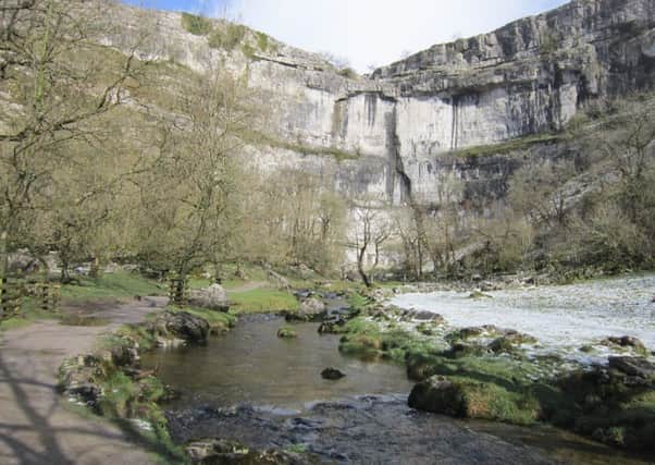 MALHAM COVE: One of the spectacular sights of Britain.