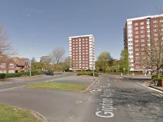 Police were called to Gipton Approach over concerns for safety for a man seen atop a high-rise building