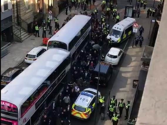 Millwall fans flood the streets of Leeds.