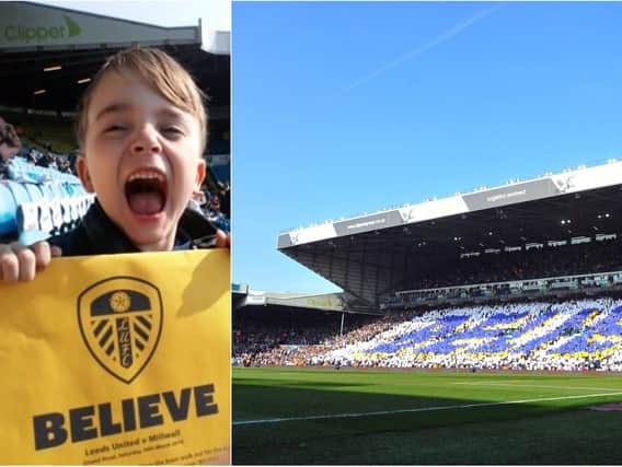 Fans, including six-year-old Zach held up cards spelling out the word BELIEVE ahead of Leeds' victory against Millwall on Saturday