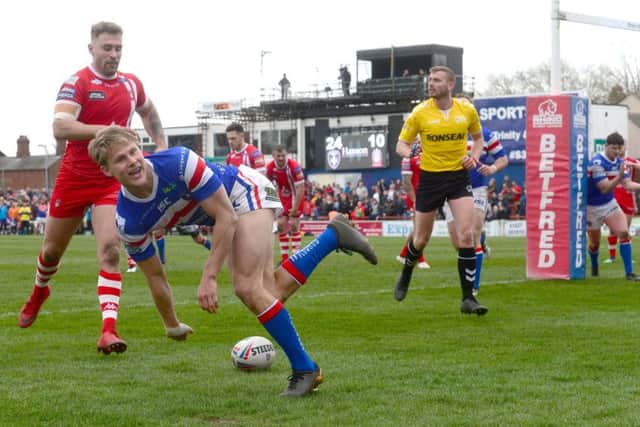 Jacob 'Milky' Miller is all smiles for the camera after scoring for Wakefield against Salford. PIC: James Hardisty
