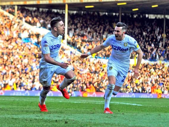 Leeds United playmaker Pablo Hernandez celebrates with Jack Harrison.