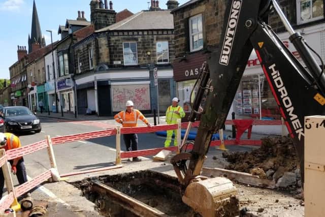 Yorkshire Water engineers work on a burst main on Otley Road last summer (pic: Robyn Vinter)