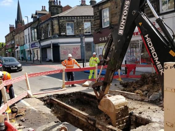 Yorkshire Water engineers work on a burst main on Otley Road last summer (pic: Robyn Vinter)