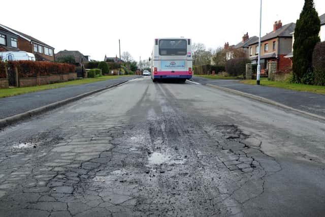 Pothole on Rakehill Road, Scholes, near Leeds in 2011.