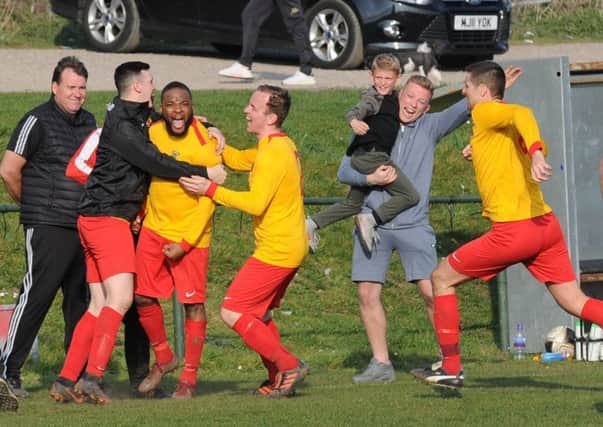 Dan Sheriffe, facing camera, celebrates his last-minute winner for Aberford in the 2-1 victory at Kippax. PIC: Steve Riding