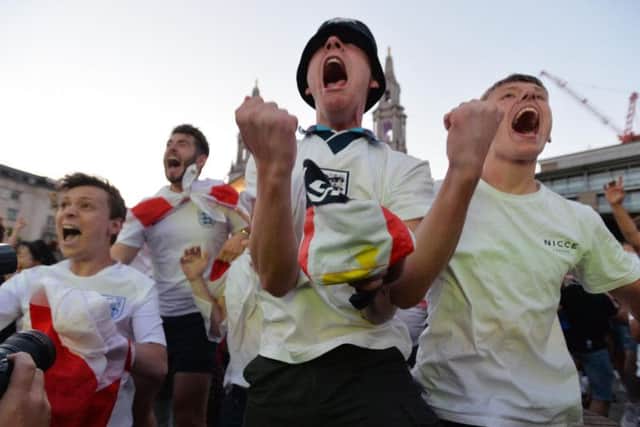England fans celebrating in Millennium Square during the 2018 World Cup.
