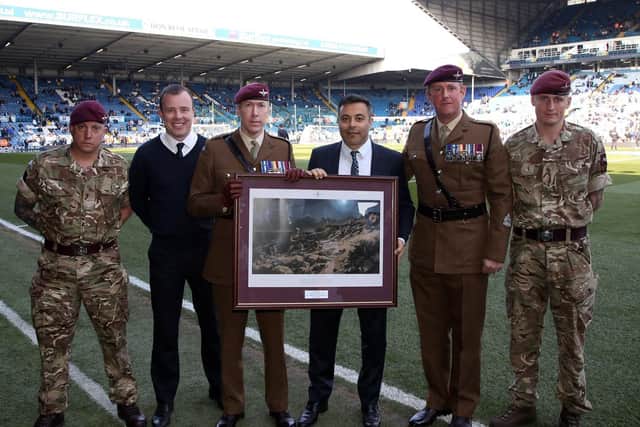 Leeds United chairman Andrea Radrizzani and chief executive Angus Kinnear with representatives from the Parachute Regiment.