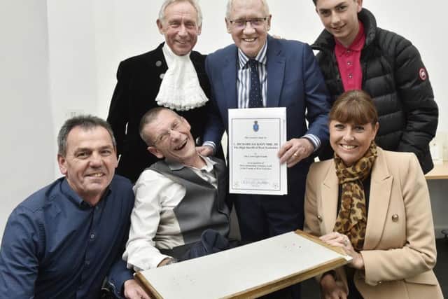 Dick and Jeanette Cartwright, their son Robbie and friend Russell Curran pictured with High Sheriff of West Yorkshire Richard Jackson and Harry Gration