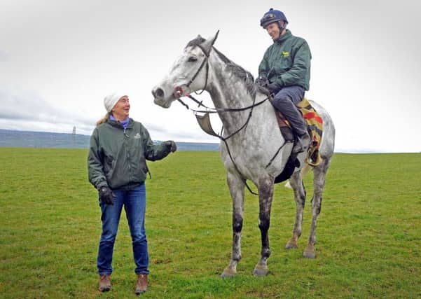 Jockey Danny Cook and trainer Sue Smith with Grand National hope Vintage Clouds.