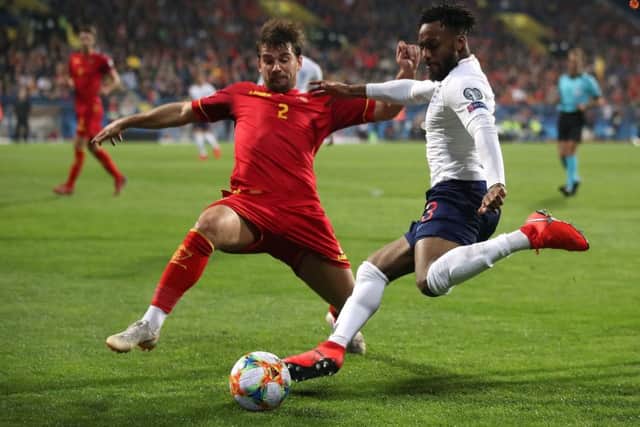 England's Danny Rose takes on Montenegro's Filip Stojkovic during last month's Euro 2020 Qualifying, Group A match in Montenegro (Picture: Nick Potts/PA Wire).