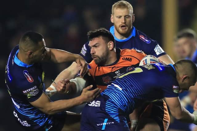 Castleford Tigers' Matt Cook (centre) impressed on his 100th appearance for the club