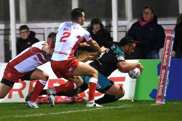 Konrad Hurrell goes over for his second try at Hull KR.