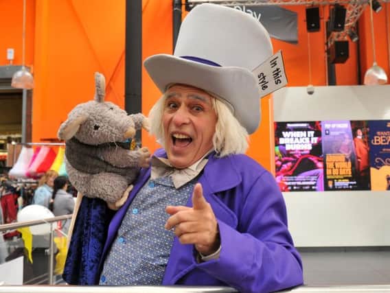 The Mad Hatter Paul Buonocore  entertaing the crowd   at the Leeds Magic Circle  Centenary event  at Kirkgate Market on Saturday. .