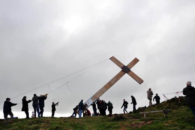 The Easter Cross is erected at Suprise View, Otley Chevin.
Picture Gerard Binks