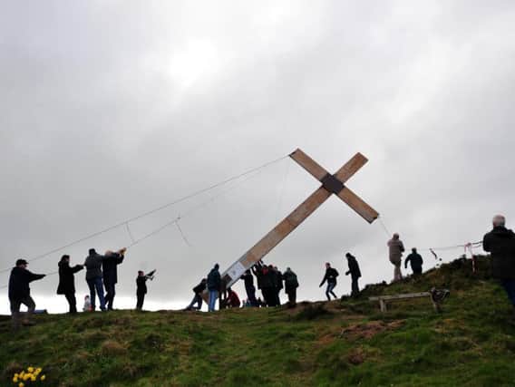 The Easter Cross is erected at Suprise View, Otley Chevin.
Picture Gerard Binks