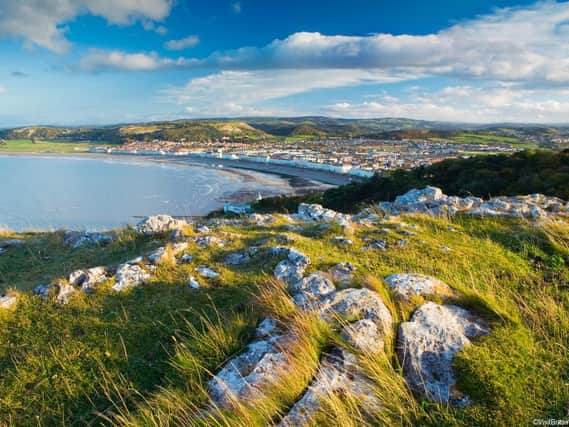 View from the top of the limestone headland ridge The Great Orme, to Llandudno historic seaside resort and waterfront in North Wales.
VisitBritain/ Lee Beel;