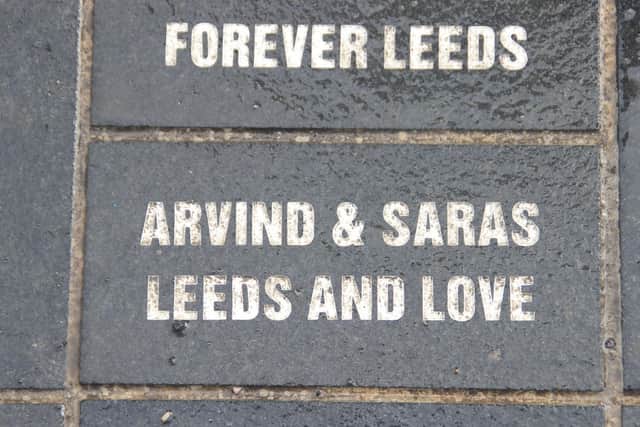 A stone in Elland Road's Bremner Square bears the names of long-distance Leeds United fan Arvind Sidhu and his wife, Saras.