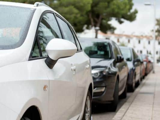 This is a driving offence under rule 248 of the Highway Code, which states You MUST NOT park on a road at night facing against the direction of the traffic flow unless in a recognised parking space.