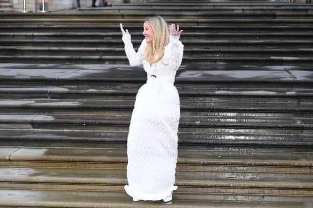 Where's the groom? Singer Ellie Goulding wears bridal white in this '80s-inspired gown by Adriana Degreas, as she arrives for the premiere of Netflix's 'Our Planet' at the Natural History Museum in Kensington, London, hosted by Sir David Attenborough. Picture: Kirsty O'Connor/PA Wire