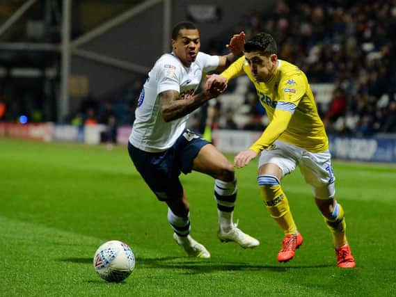 Pablo Hernandez takes on Lukas Nmecha during Leeds United's 2-0 win at Preston North End.