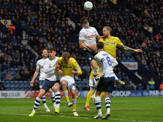 Pontus Jansson, right, challenges for a header in Leeds United's win at Preston.