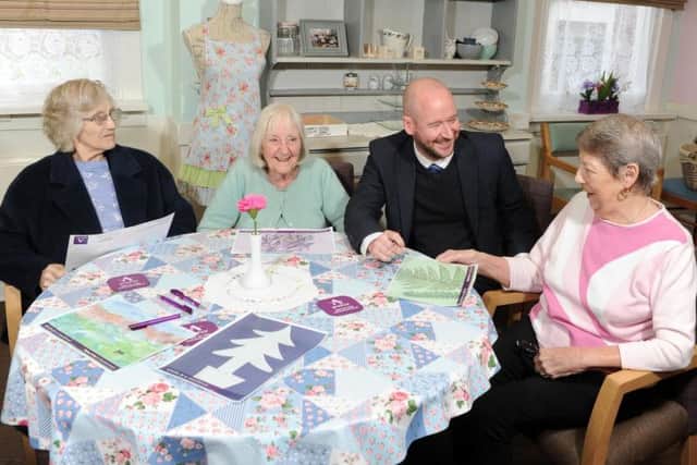 David Wood, Anchors community partnership manager with  Val Ashford, Ann Paul and Maureen Jones, residents at Halcyon Court care home in in Cliff Road, Headingley.
Pensioners living at Halcyon Court -  along with residents at Beech Hall in Armley, and Oak Tree Lodge in Gipton - have designed postcards that will be placed in community hubs across the city.
 The aim is for people to send the postcards back to the residents so they can start writing to each other. 
Picture: Tony Johnson