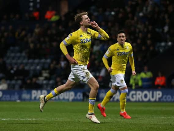Patrick Bamford runs towards the away end at Deepdale after scoring Leeds United's opening goal against Preston.