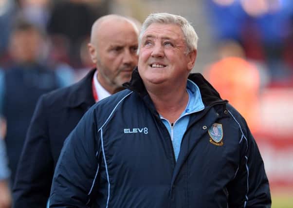 LOOKING UP: Steve Bruce, above, has turned Sheffield Wednesdays results around and has taken the Owls to the brink of the play-offs. PIC: Steve Ellis