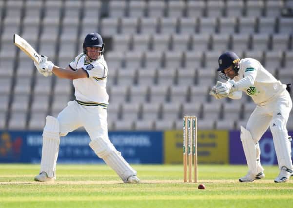 LEADING MAN: Yorkshire's Gary Ballance cuts through cover point as Hampshire wicketkeeper Lewis McManus looks on at The Ageas Bowl. Picture: Mike Hewitt/Getty Images