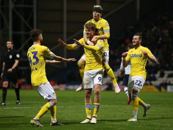 THRIVING: Patrick Bamford celebates with his Leeds United team-mates in Tuesday night's 2-0 win at Preston.