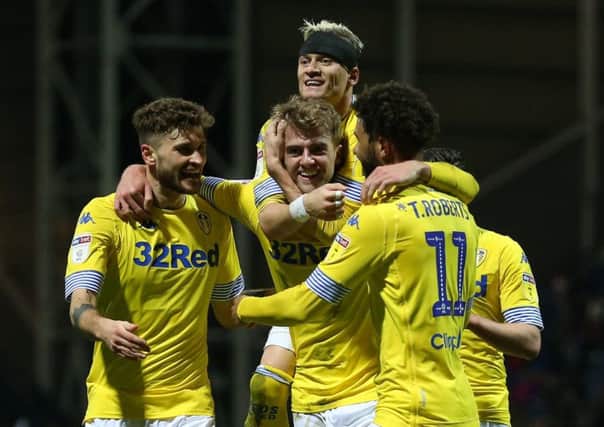 Leeds United's Patrick Bamford (centre) celebrates scoring his side's second goal at Preston on Tuesday.