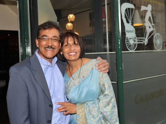 Kishor and Hansa Dabhi pictured outside their restaurant during the 30th birthday celebrations in 2016.