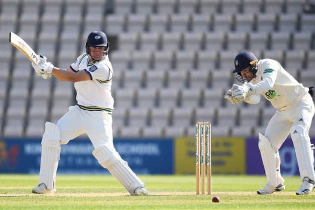 Gary Ballance of Yorkshire hits out as wicketkeeper Lewis McManus of Hampshire looks on during the Specsavers County Championship Division One match between Hampshire and Yorkshire at Ageas Bowl. (Picture: Mike Hewitt/Getty Images)