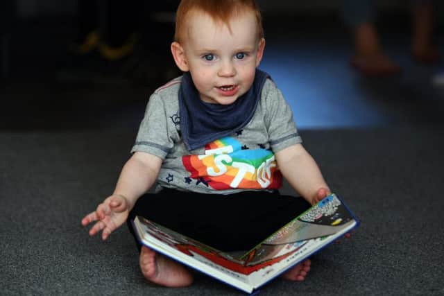 Jack Humphreys loves toys and books despite his rare condition.
