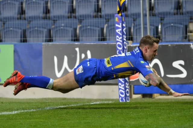 Richie Myler dives over for his second try. PIC: Bruce Rollinson
