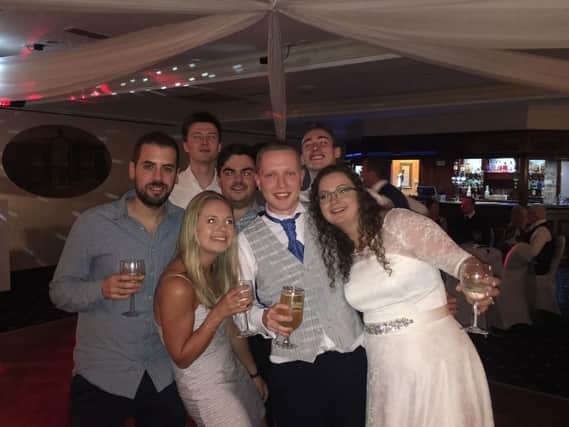 Poppy (front left) with friends at a wedding, in a photo posted by Team Poppy on their fundraising page