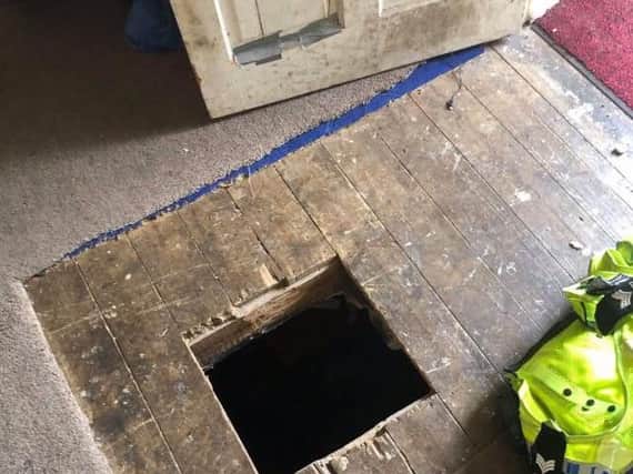 A wanted man in Leeds managed to escape from the police by dropping into a homemade bolthole. Photo: West Yorkshire Police Leeds West