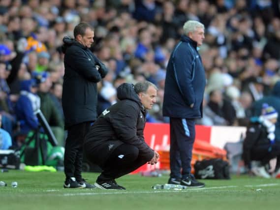 Leeds United head coach Marcelo Bielsa (near) and Sheffield Wednesday boss Steve Bruce (far).